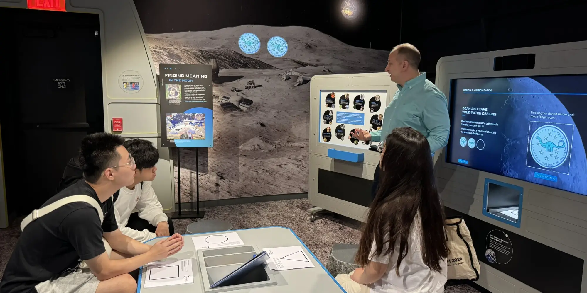 Fall 2024’s MoonRover team in discussion with Moonshot Museum’s Mike Hennessy.